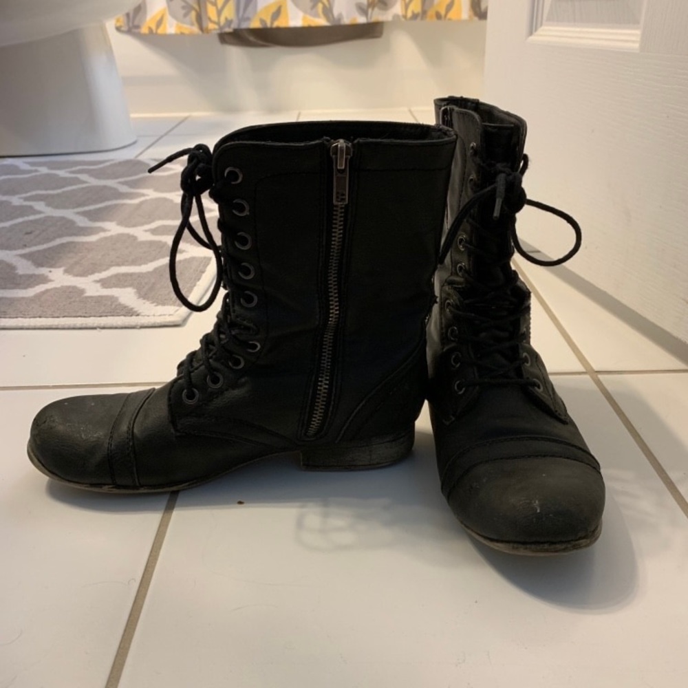 Black combat boots.